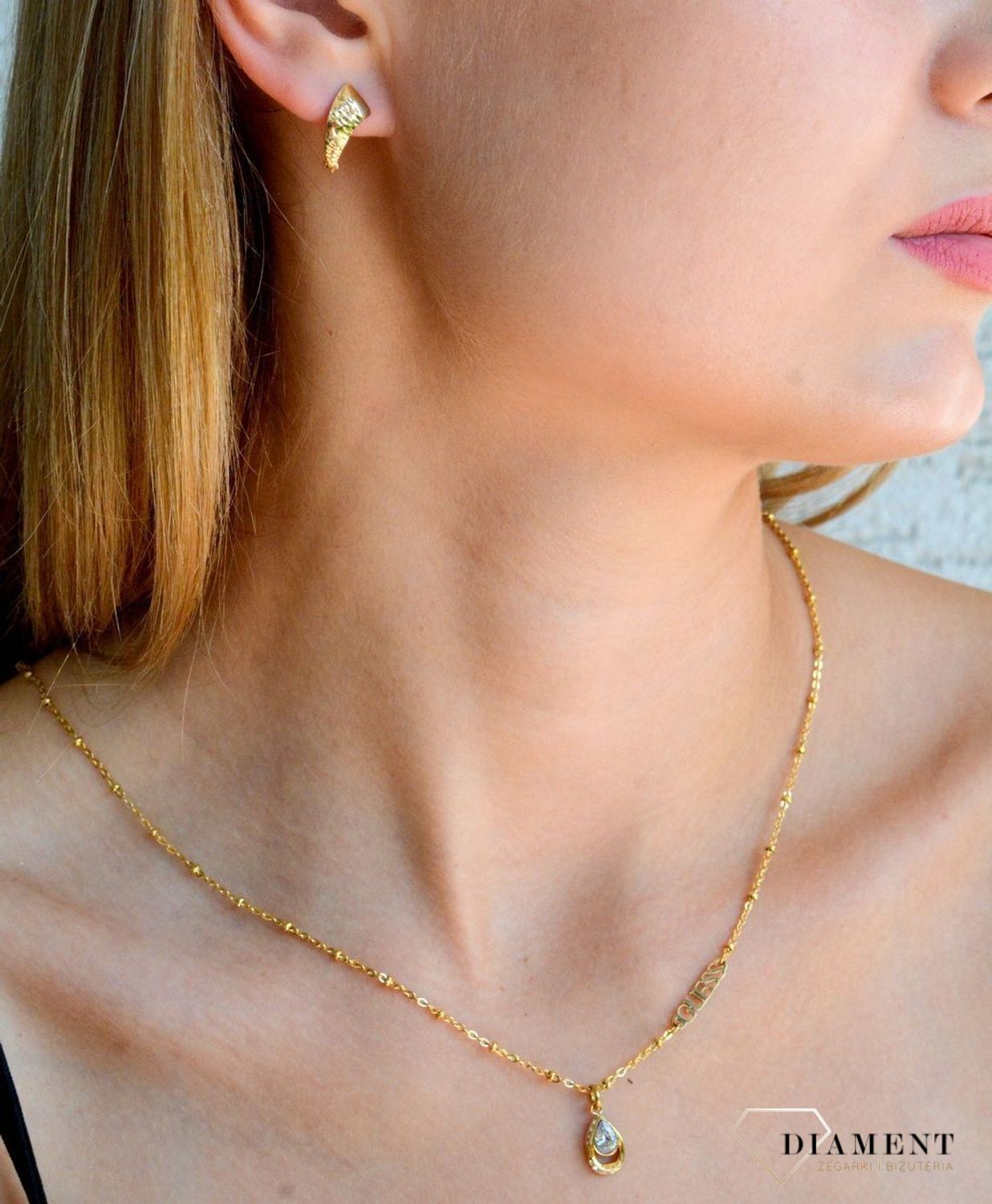 Złote kolczyki damskie 375 klasyczne z ozdobnym grawerowaniem KL 3367A 375.jpg